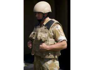 A Royal Marines Commando shows off the enhanced Mark 7 helmet and Osprey Assault body armour at DVD 2009