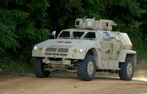 JLTV driving on test track at Aberdeen Test Center, Md.