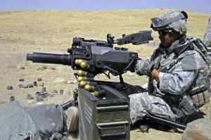 A U.S. Special Forces Soldier fires a MK-47 grenade launcher at a stationary target during a training exercise in Iraq.