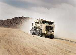 Oshkosh Defense received a delivery order to begin production of the Heavy Equipment Transporter (HET) A1