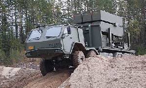 The Sisu 8x8 loaded with a NASAMS launcher